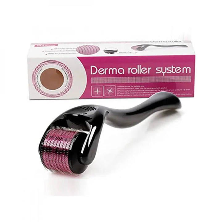 Derma roller system with black handle and pink metallic head, and packaging on a white background